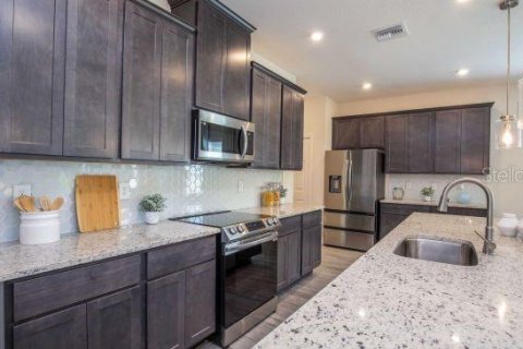 House in Mascotte, Florida 3 bedrooms, 184.69 sq.m. № 2122100 - photo 6