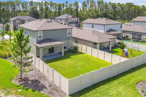 House in Land O' Lakes, Florida 6 bedrooms, 239.69 sq.m. № 2341625 - photo 3